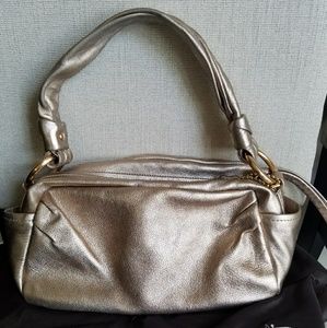 Rose gold leather coach bag